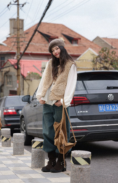 オーバーサイズバックルベスト